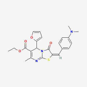 molecular formula C23H23N3O4S B2684392 (E)-ethyl 2-(4-(dimethylamino)benzylidene)-5-(furan-2-yl)-7-methyl-3-oxo-3,5-dihydro-2H-thiazolo[3,2-a]pyrimidine-6-carboxylate CAS No. 432020-00-3