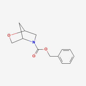 molecular formula C13H15NO3 B2685932 苄基2-氧杂-5-氮杂双环[2.2.1]庚烷-5-羧酸酯 CAS No. 1865558-56-0