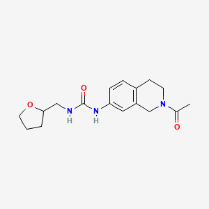 1-(2-Acetyl-1,2,3,4-tetrahydroisoquinolin-7-yl)-3-((tetrahydrofuran-2-yl)methyl)urea