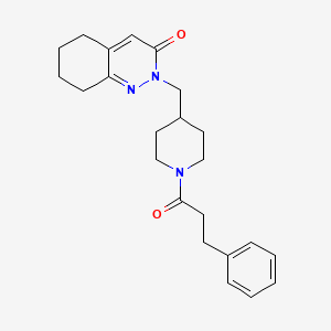 B2686395 2-[[1-(3-Phenylpropanoyl)piperidin-4-yl]methyl]-5,6,7,8-tetrahydrocinnolin-3-one CAS No. 2309539-45-3