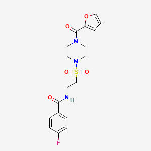 molecular formula C18H20FN3O5S B2687595 4-fluoro-N-[2-[4-(furan-2-carbonyl)piperazin-1-yl]sulfonylethyl]benzamide CAS No. 899967-84-1