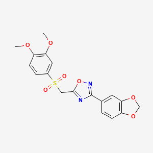 molecular formula C18H16N2O7S B2687742 3-(1,3-Benzodioxol-5-yl)-5-{[(3,4-dimethoxyphenyl)sulfonyl]methyl}-1,2,4-oxadiazole CAS No. 1105234-29-4