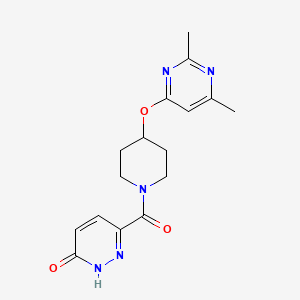 molecular formula C16H19N5O3 B2687938 6-(4-((2,6-二甲基嘧啶-4-基氧基)哌啶-1-基)甲酰基)吡啶并[3(2H)-酮-3-基 CAS No. 2034472-47-2