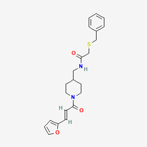 molecular formula C22H26N2O3S B2688490 (E)-2-(benzylthio)-N-((1-(3-(furan-2-yl)acryloyl)piperidin-4-yl)methyl)acetamide CAS No. 1235696-98-6