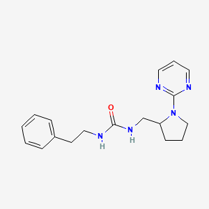 molecular formula C18H23N5O B2689820 1-(2-Phenylethyl)-3-{[1-(pyrimidin-2-yl)pyrrolidin-2-yl]methyl}urea CAS No. 2097930-12-4