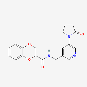 molecular formula C19H19N3O4 B2690637 N-{[5-(2-oxopyrrolidin-1-yl)pyridin-3-yl]methyl}-2,3-dihydro-1,4-benzodioxine-2-carboxamide CAS No. 2097924-15-5