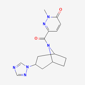 molecular formula C15H18N6O2 B2690781 6-((1R,5S)-3-(1H-1,2,4-triazol-1-yl)-8-azabicyclo[3.2.1]octane-8-carbonyl)-2-methylpyridazin-3(2H)-one CAS No. 2320220-98-0