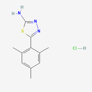 molecular formula C11H14ClN3S B2690899 5-三甲基苯基-1,3,4-噻二唑-2-胺盐酸盐 CAS No. 1396867-24-5