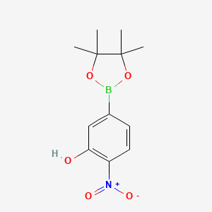 molecular formula C12H16BNO5 B2692535 2-硝基-5-(4,4,5,5-四甲基-1,3,2-二氧杂硼杂环戊烷-2-基)苯酚 CAS No. 1339927-68-2