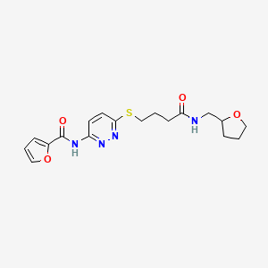 molecular formula C18H22N4O4S B2692648 N-(6-((4-oxo-4-(((tetrahydrofuran-2-yl)methyl)amino)butyl)thio)pyridazin-3-yl)furan-2-carboxamide CAS No. 1040649-48-6