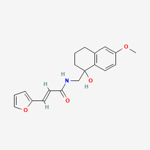 (E)-3-(furan-2-yl)-N-((1-hydroxy-6-methoxy-1,2,3,4-tetrahydronaphthalen-1-yl)methyl)acrylamide