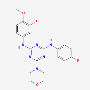 molecular formula C21H23FN6O3 B2692898 N-(3,4-dimethoxyphenyl)-N'-(4-fluorophenyl)-6-(morpholin-4-yl)-1,3,5-triazine-2,4-diamine CAS No. 898630-86-9