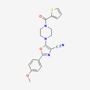 2-(4-Methoxyphenyl)-5-(4-(thiophene-2-carbonyl)piperazin-1-yl)oxazole-4-carbonitrile