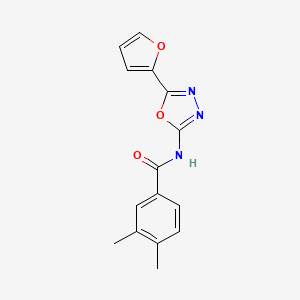 molecular formula C15H13N3O3 B2693553 N-[5-(furan-2-yl)-1,3,4-oxadiazol-2-yl]-3,4-dimethylbenzamide CAS No. 851095-30-2