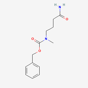 molecular formula C13H18N2O3 B2694140 Benzyl 3-carbamoylpropylmethylcarbamate CAS No. 1822852-17-4