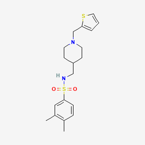 molecular formula C19H26N2O2S2 B2694313 3,4-dimethyl-N-((1-(thiophen-2-ylmethyl)piperidin-4-yl)methyl)benzenesulfonamide CAS No. 952966-42-6