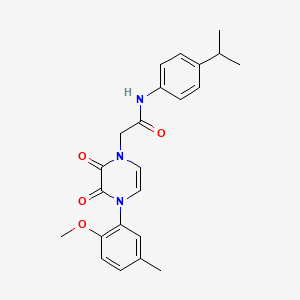 molecular formula C23H25N3O4 B2694516 2-[4-(2-methoxy-5-methylphenyl)-2,3-dioxopyrazin-1-yl]-N-(4-propan-2-ylphenyl)acetamide CAS No. 898463-85-9