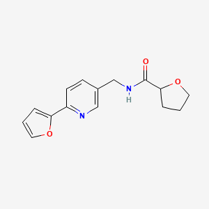 molecular formula C15H16N2O3 B2695327 N-((6-(furan-2-yl)pyridin-3-yl)methyl)tetrahydrofuran-2-carboxamide CAS No. 2034394-64-2