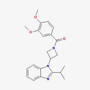(3,4-Dimethoxyphenyl)-[3-(2-propan-2-ylbenzimidazol-1-yl)azetidin-1-yl]methanone
