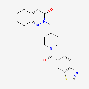 molecular formula C22H24N4O2S B2696099 2-{[1-(1,3-Benzothiazole-6-carbonyl)piperidin-4-yl]methyl}-2,3,5,6,7,8-hexahydrocinnolin-3-one CAS No. 2194844-05-6