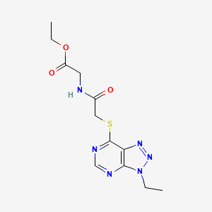 molecular formula C12H16N6O3S B2697639 乙酸2-(2-((3-乙基-3H-[1,2,3]三唑[4,5-d]嘧啶-7-基)硫)乙酰胺基)乙酯 CAS No. 1058238-85-9