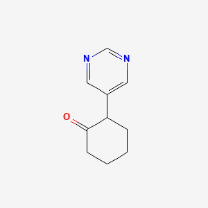 2-(Pyrimidin-5-yl)cyclohexan-1-one