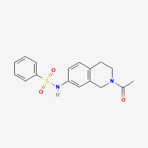 molecular formula C17H18N2O3S B2698966 N-(2-acetyl-1,2,3,4-tetrahydroisoquinolin-7-yl)benzenesulfonamide CAS No. 115955-98-1