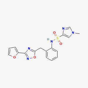 molecular formula C17H15N5O4S B2699127 N-(2-((3-(furan-2-yl)-1,2,4-oxadiazol-5-yl)methyl)phenyl)-1-methyl-1H-imidazole-4-sulfonamide CAS No. 1797960-15-6