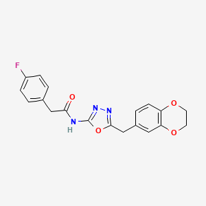 molecular formula C19H16FN3O4 B2699208 N-(5-((2,3-dihydrobenzo[b][1,4]dioxin-6-yl)methyl)-1,3,4-oxadiazol-2-yl)-2-(4-fluorophenyl)acetamide CAS No. 921990-47-8