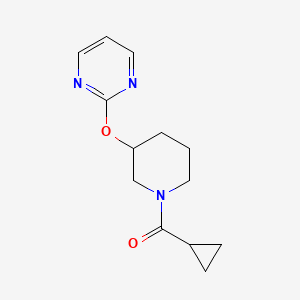 molecular formula C13H17N3O2 B2700228 2-[(1-cyclopropanecarbonylpiperidin-3-yl)oxy]pyrimidine CAS No. 2034498-16-1