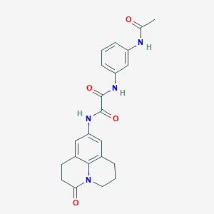 molecular formula C22H22N4O4 B2700320 N1-(3-acetamidophenyl)-N2-(3-oxo-1,2,3,5,6,7-hexahydropyrido[3,2,1-ij]quinolin-9-yl)oxalamide CAS No. 898438-47-6