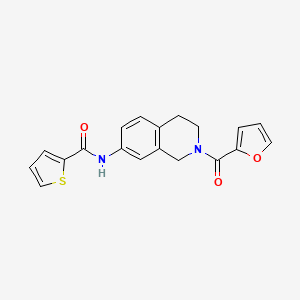 molecular formula C19H16N2O3S B2700596 N-(2-(furan-2-carbonyl)-1,2,3,4-tetrahydroisoquinolin-7-yl)thiophene-2-carboxamide CAS No. 955685-29-7