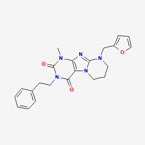 molecular formula C22H23N5O3 B2701197 9-(furan-2-ylmethyl)-1-methyl-3-phenethyl-6,7,8,9-tetrahydropyrimido[2,1-f]purine-2,4(1H,3H)-dione CAS No. 876151-07-4