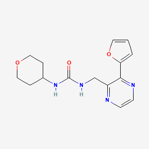 1-((3-(furan-2-yl)pyrazin-2-yl)methyl)-3-(tetrahydro-2H-pyran-4-yl)urea