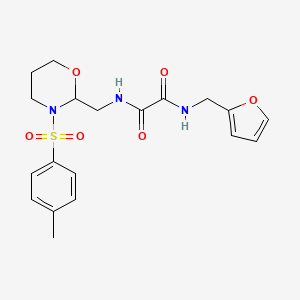 molecular formula C19H23N3O6S B2702261 N1-(呋喃-2-基甲基)-N2-((3-对甲苯-1,3-噁唑啉-2-基)甲基)草酰胺 CAS No. 869071-42-1
