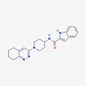 molecular formula C22H25N5O B2702576 N-(1-(5,6,7,8-tetrahydrocinnolin-3-yl)piperidin-4-yl)-1H-indole-2-carboxamide CAS No. 2034503-40-5