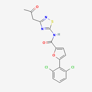 5-(2,6-dichlorophenyl)-N-(3-(2-oxopropyl)-1,2,4-thiadiazol-5-yl)furan-2-carboxamide