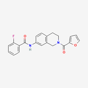 molecular formula C21H17FN2O3 B2703156 2-fluoro-N-(2-(furan-2-carbonyl)-1,2,3,4-tetrahydroisoquinolin-7-yl)benzamide CAS No. 955665-84-6