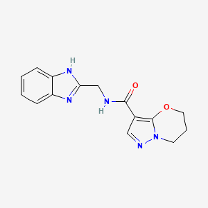 molecular formula C15H15N5O2 B2703644 N-((1H-benzo[d]imidazol-2-yl)methyl)-6,7-dihydro-5H-pyrazolo[5,1-b][1,3]oxazine-3-carboxamide CAS No. 1428363-30-7