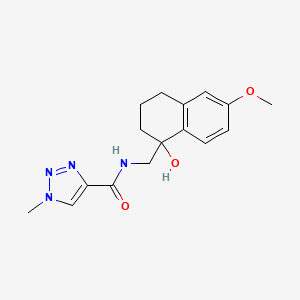 N-((1-hydroxy-6-methoxy-1,2,3,4-tetrahydronaphthalen-1-yl)methyl)-1-methyl-1H-1,2,3-triazole-4-carboxamide