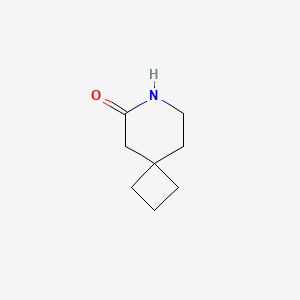molecular formula C8H13NO B2704510 7-氮杂螺[3.5]壬烷-6-酮 CAS No. 2344685-49-8