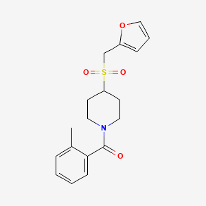 molecular formula C18H21NO4S B2704738 (4-((Furan-2-ylmethyl)sulfonyl)piperidin-1-yl)(o-tolyl)methanone CAS No. 1448051-10-2