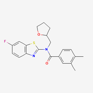 molecular formula C21H21FN2O2S B2704929 N-(6-fluorobenzo[d]thiazol-2-yl)-3,4-dimethyl-N-((tetrahydrofuran-2-yl)methyl)benzamide CAS No. 920163-94-6