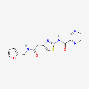molecular formula C15H13N5O3S B2704947 N-(4-(2-((furan-2-ylmethyl)amino)-2-oxoethyl)thiazol-2-yl)pyrazine-2-carboxamide CAS No. 1207000-90-5