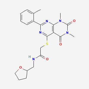 molecular formula C22H25N5O4S B2705000 2-((6,8-dimethyl-5,7-dioxo-2-(o-tolyl)-5,6,7,8-tetrahydropyrimido[4,5-d]pyrimidin-4-yl)thio)-N-((tetrahydrofuran-2-yl)methyl)acetamide CAS No. 872629-31-7