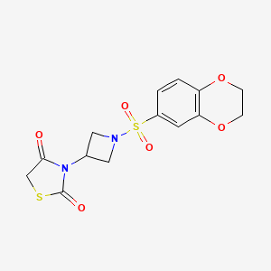 molecular formula C14H14N2O6S2 B2705922 3-(1-((2,3-Dihydrobenzo[b][1,4]dioxin-6-yl)sulfonyl)azetidin-3-yl)thiazolidine-2,4-dione CAS No. 1795423-08-3
