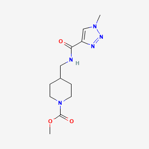 molecular formula C12H19N5O3 B2706820 methyl 4-((1-methyl-1H-1,2,3-triazole-4-carboxamido)methyl)piperidine-1-carboxylate CAS No. 1797246-90-2