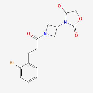 molecular formula C15H15BrN2O4 B2706968 3-(1-(3-(2-Bromophenyl)propanoyl)azetidin-3-yl)oxazolidine-2,4-dione CAS No. 2034425-81-3