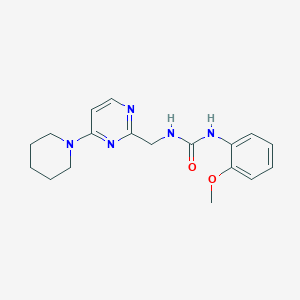B2707246 1-(2-Methoxyphenyl)-3-((4-(piperidin-1-yl)pyrimidin-2-yl)methyl)urea CAS No. 1797292-12-6