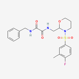 molecular formula C21H24FN3O5S B2707540 N1-苄基-N2-((3-((4-氟-3-甲基苯基)磺酰)-1,3-噁唑环丙烷-2-基)甲基)草酰胺 CAS No. 872724-65-7